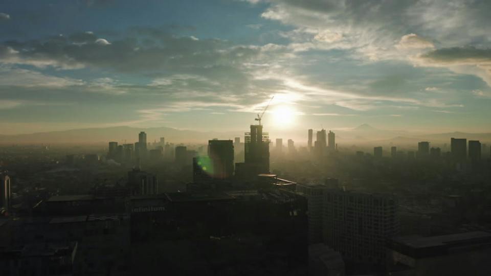 Rising over the city at sunrise