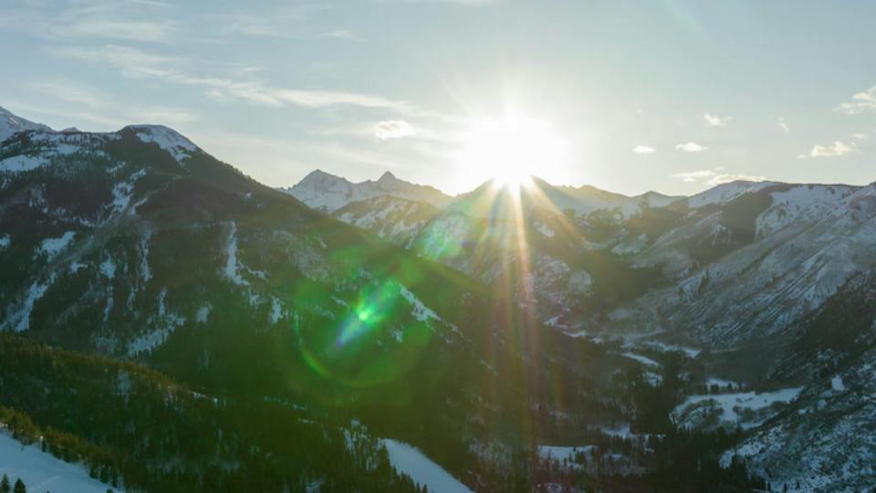 The sun breaking over the mountains